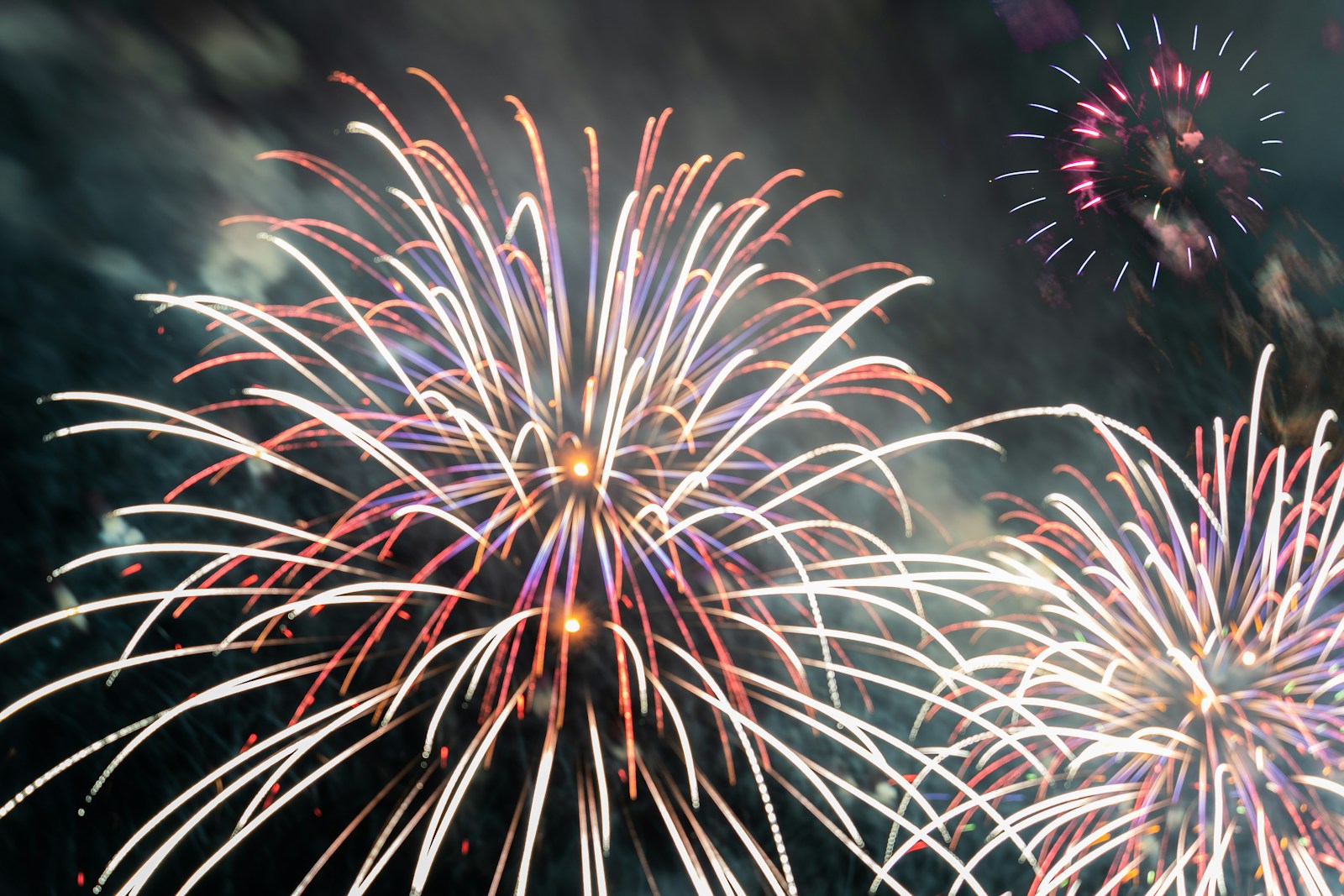 a bunch of fireworks that are in the sky